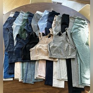 Outdoor Voices lot of 13 leggings and 4 sports bras. Size XS & S